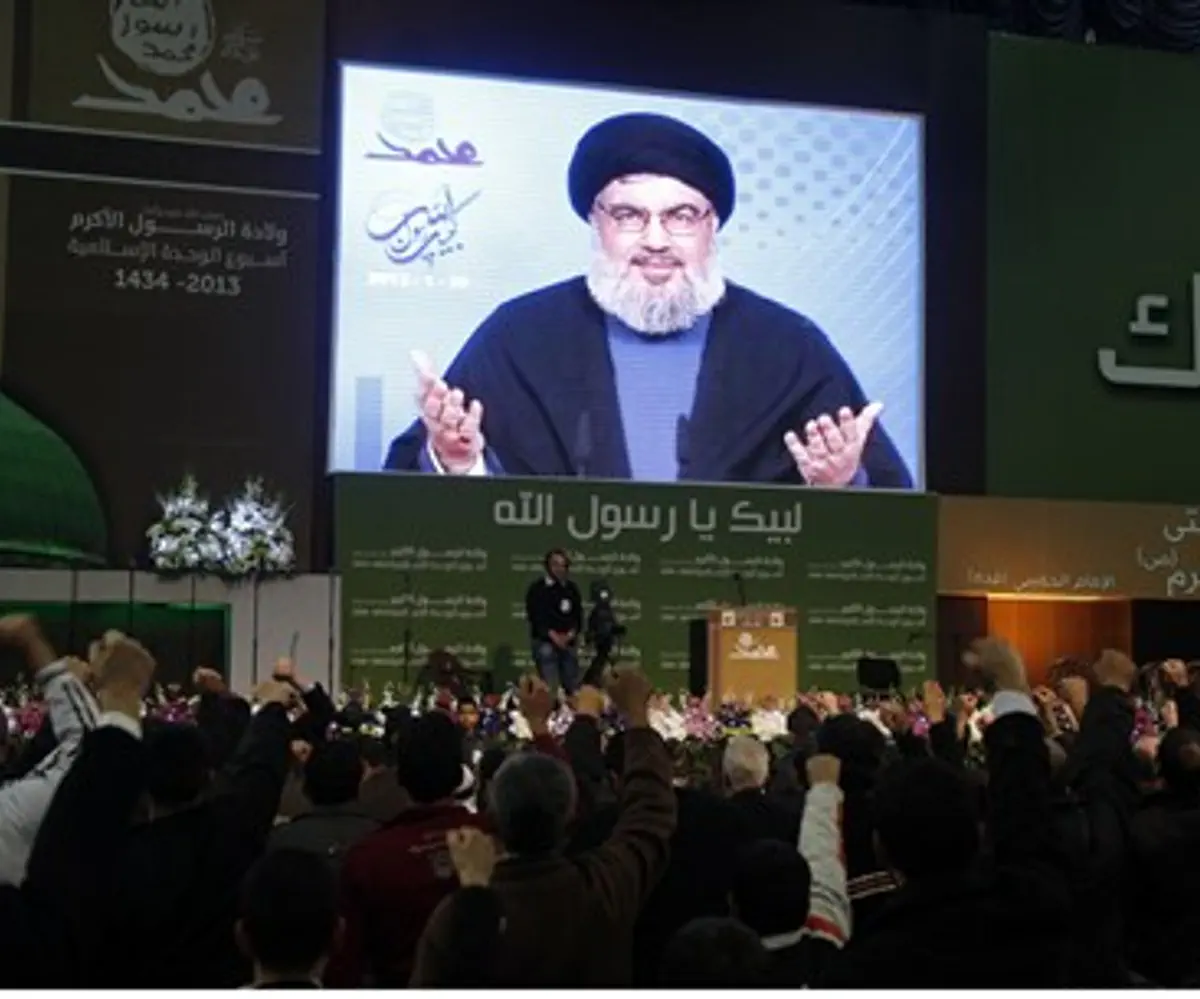 Nasrallah addresses supporters from a screen