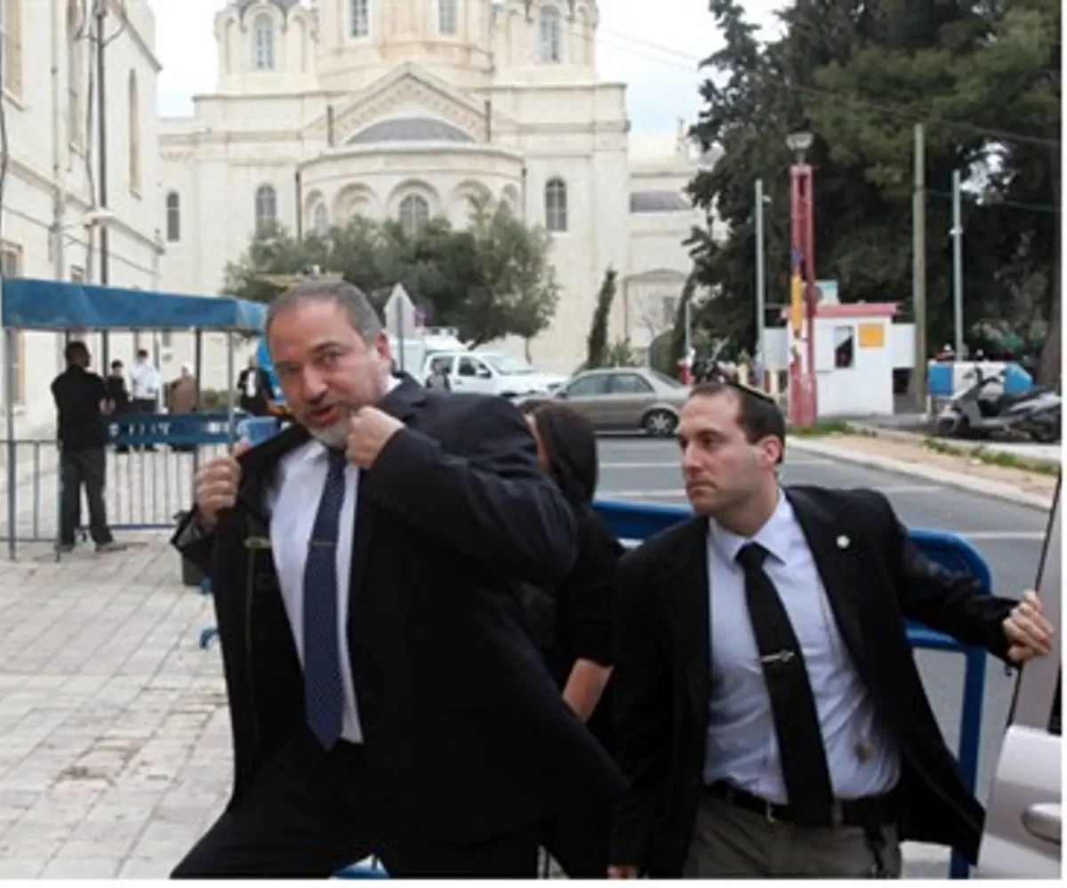 Avigdor Lieberman, leaving court Sunday
