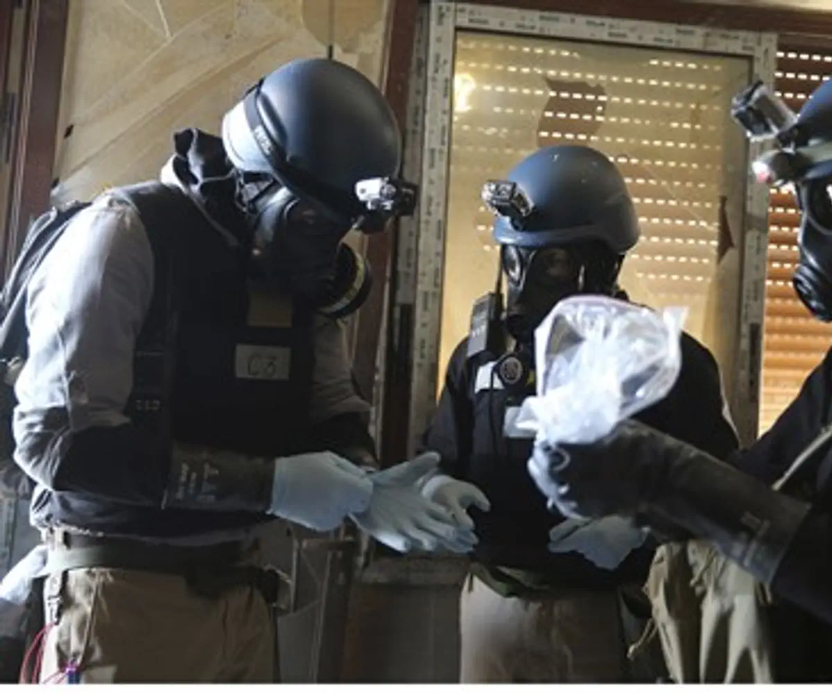 UN experts at the site ofo chemical attack