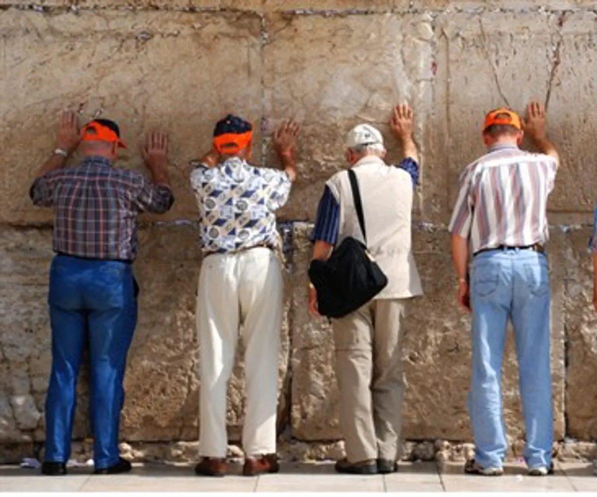 Tourists at Kotel (Western Wall) in Jerusalem