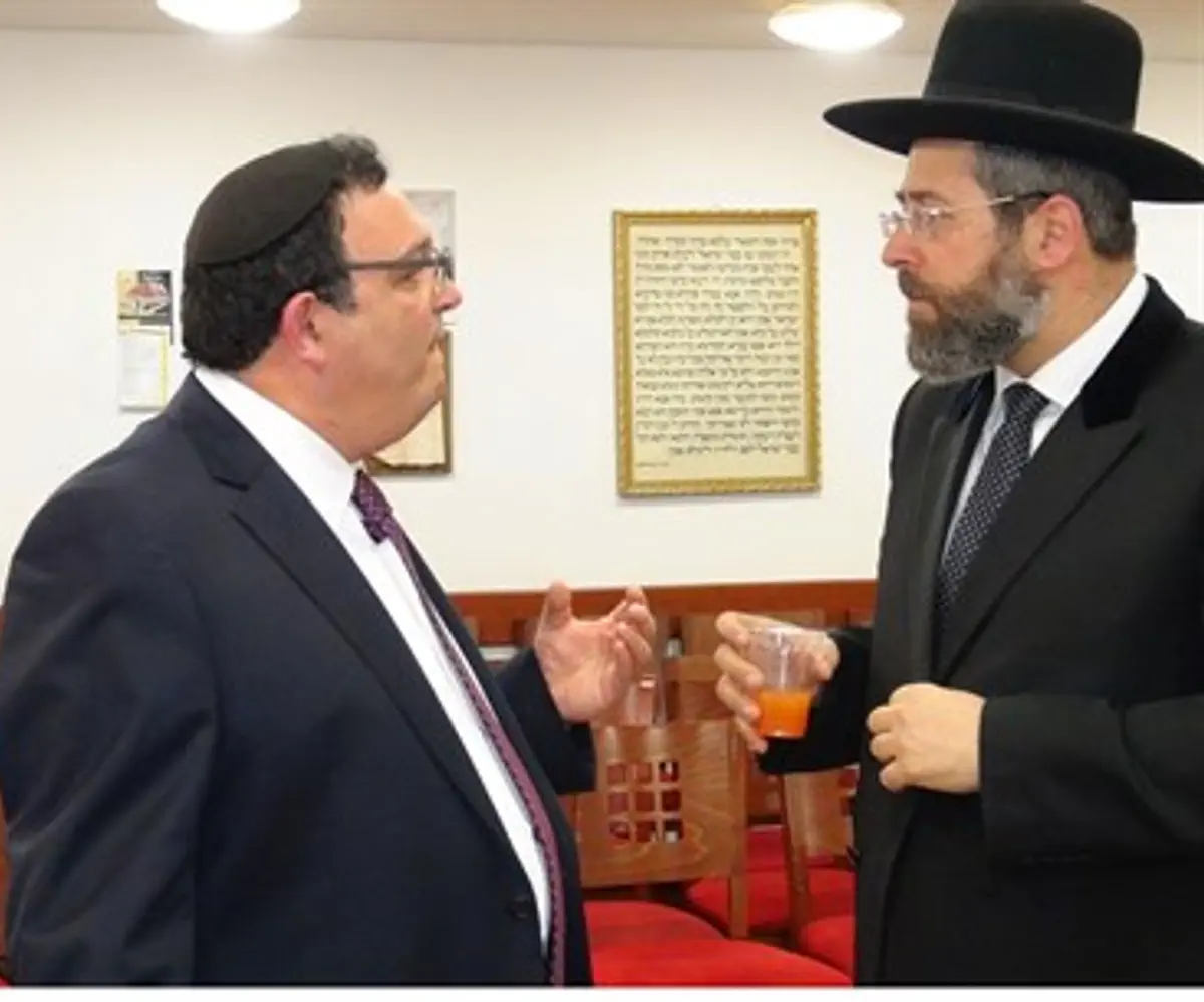 Rabbis David Lau (right) and Shai Piron