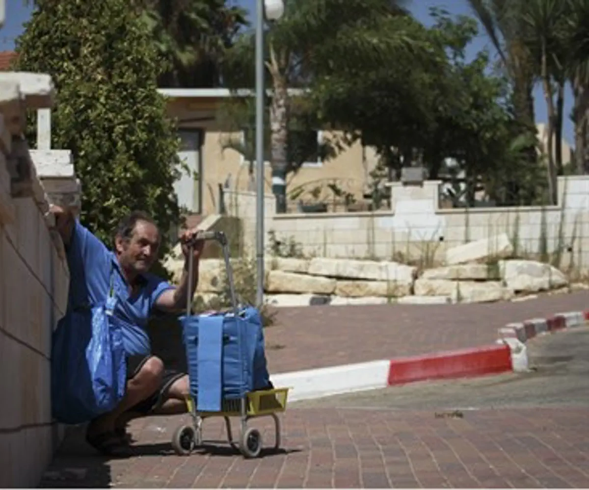 Elderly Sderot man takes cover after siren