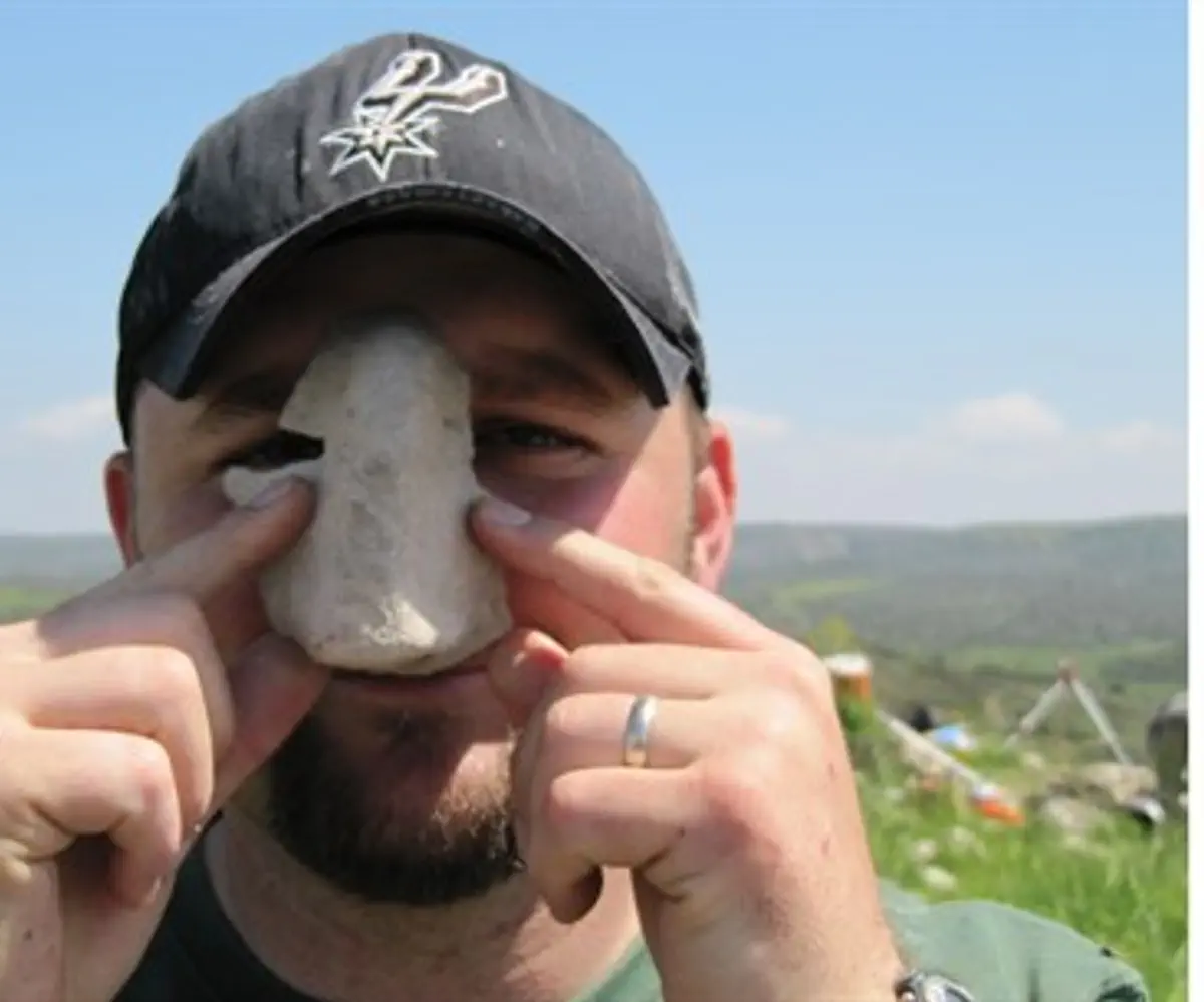Remnants of a mask discovered at the site