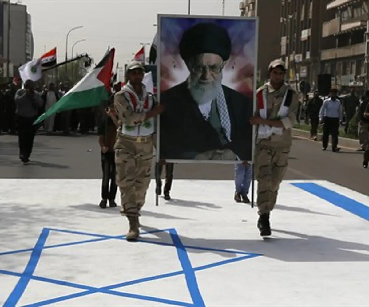 Quds Day march on Israeli flag with Ali Khamenei's picture