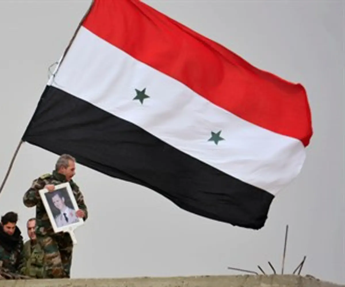 Syrian soldiers with Bashar al-Assad's picture (illustration)