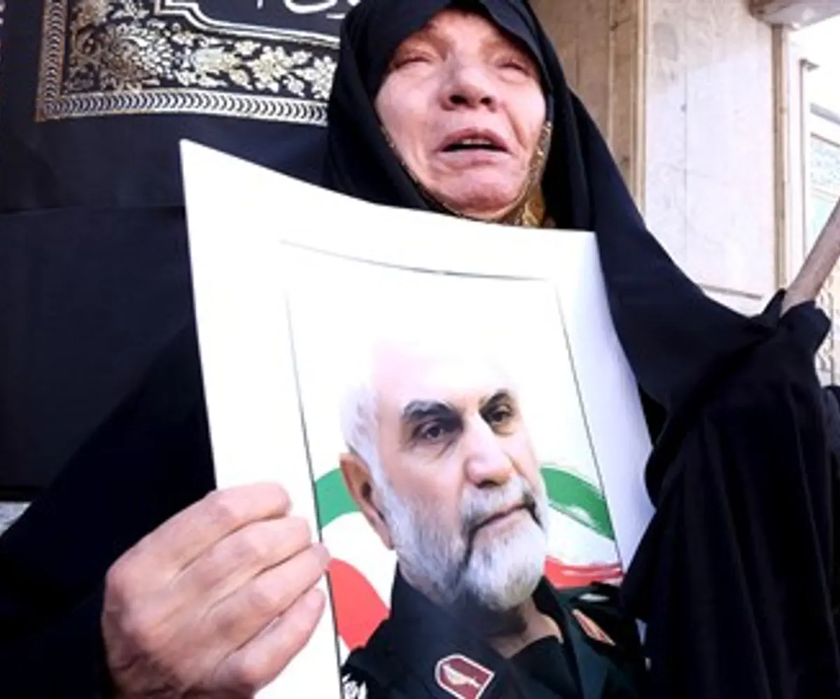 Mourner at funeral of slain Iranian general Hossein Hamedani