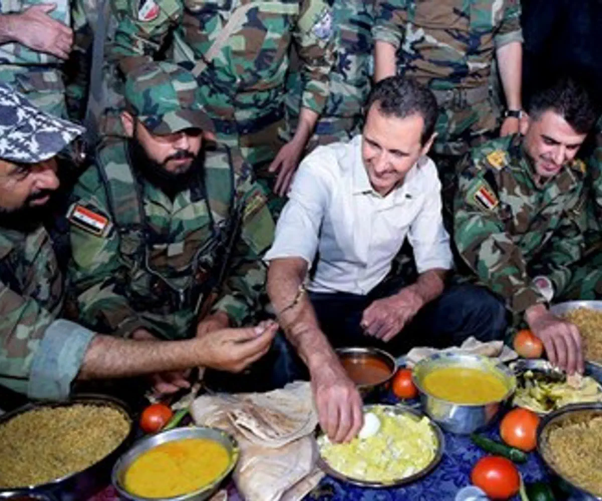 Bashar al-Assad breaks Ramadan fast with Syrian regime troops