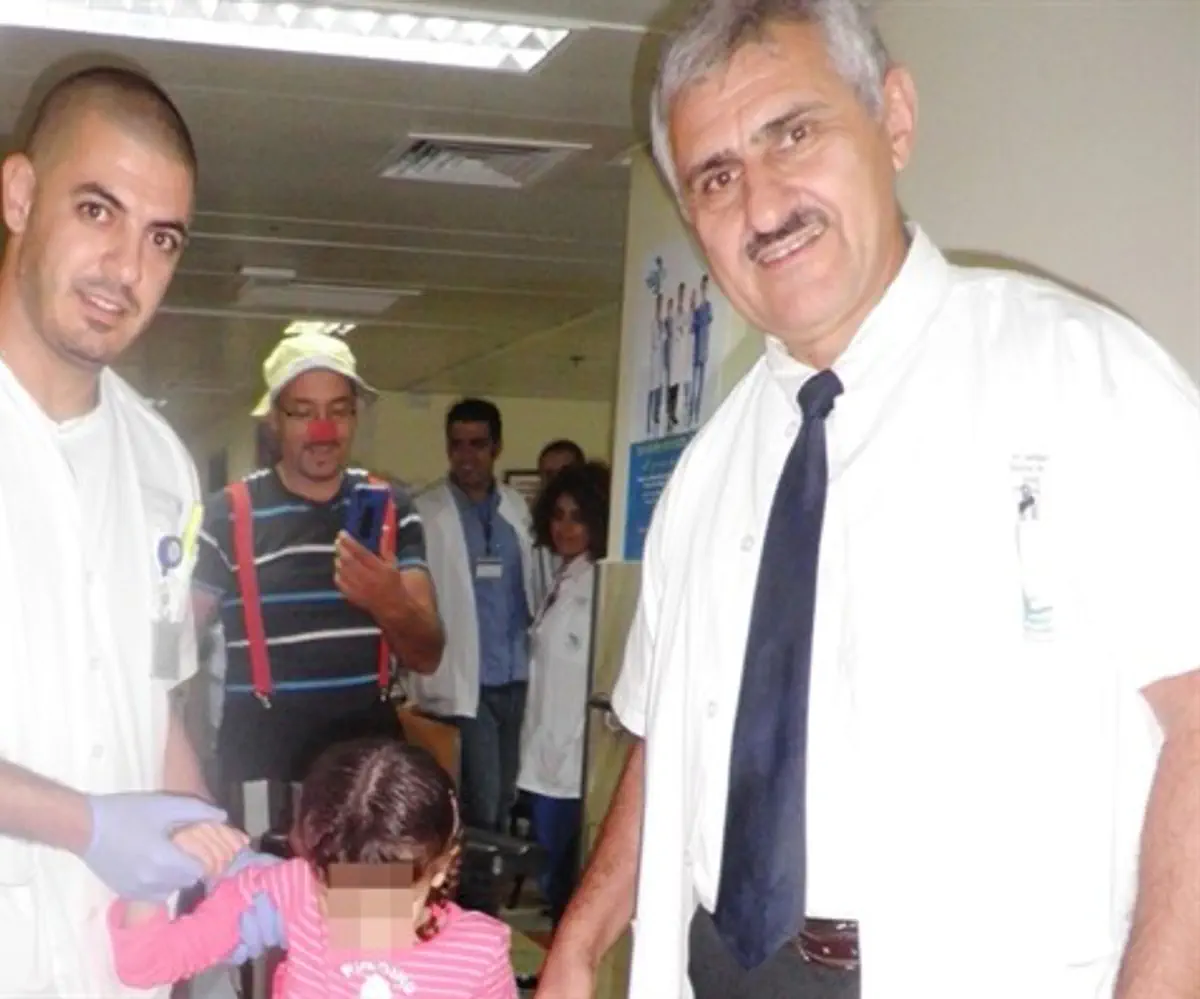 Dr Alexander Lerner, Head of the Orthopedic Department injured Syrian girl