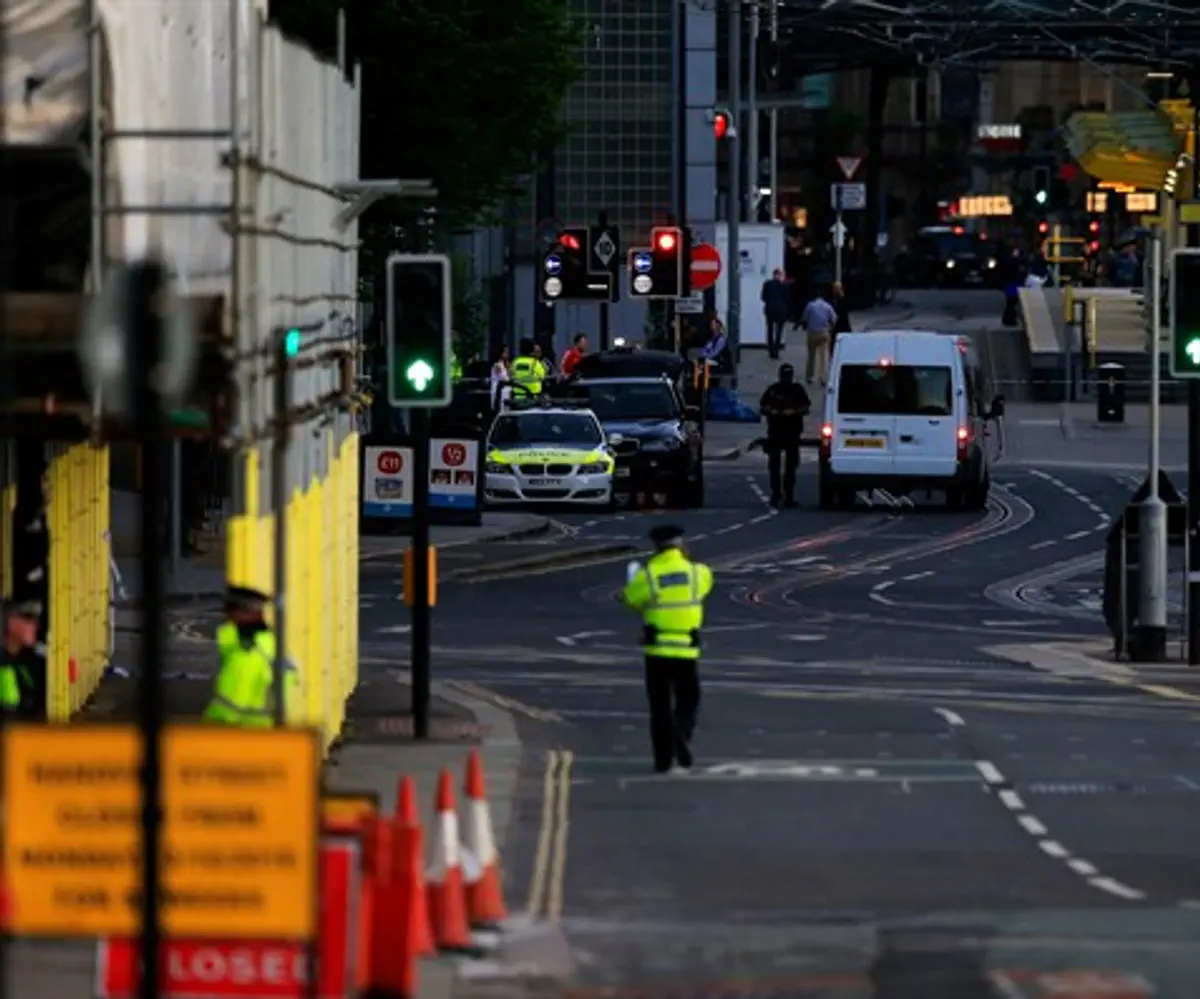 Police patrol outside the Manchester Arena