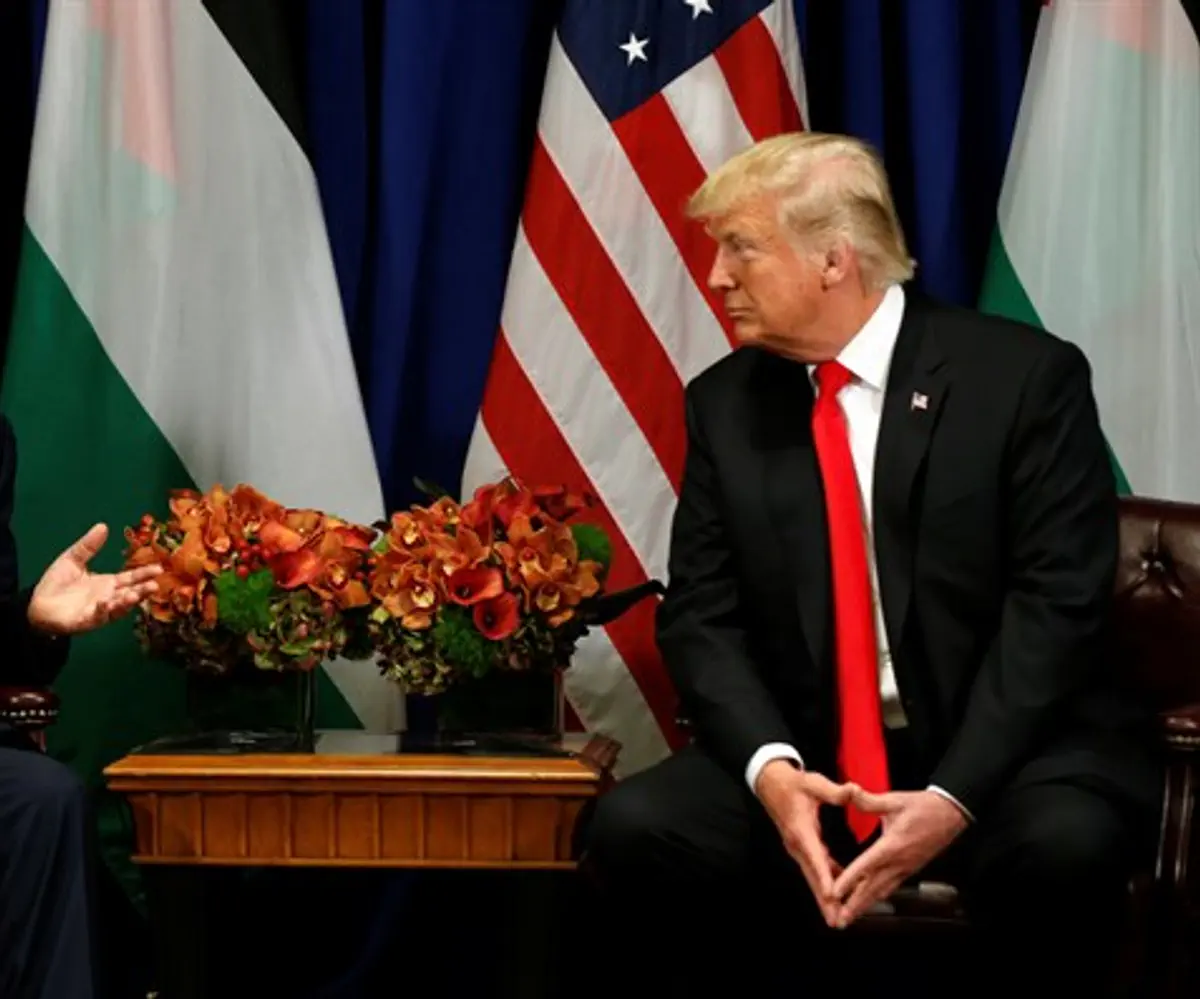 Palestinian Authority Chairman Mahmoud Abbas and US President Donald Trump