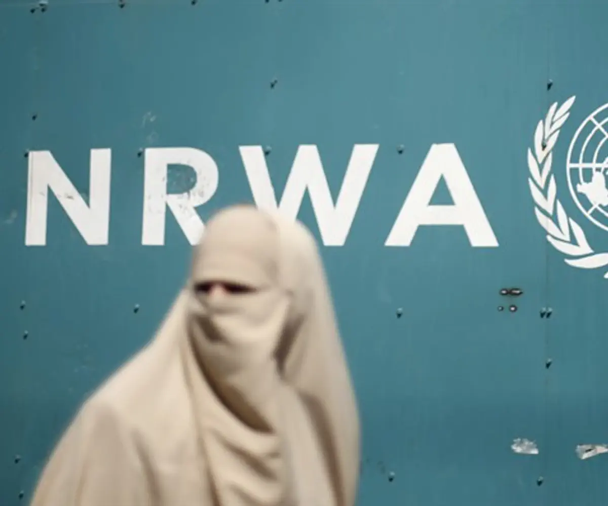Arab woman outsides UNRWA headquarters in Gaza