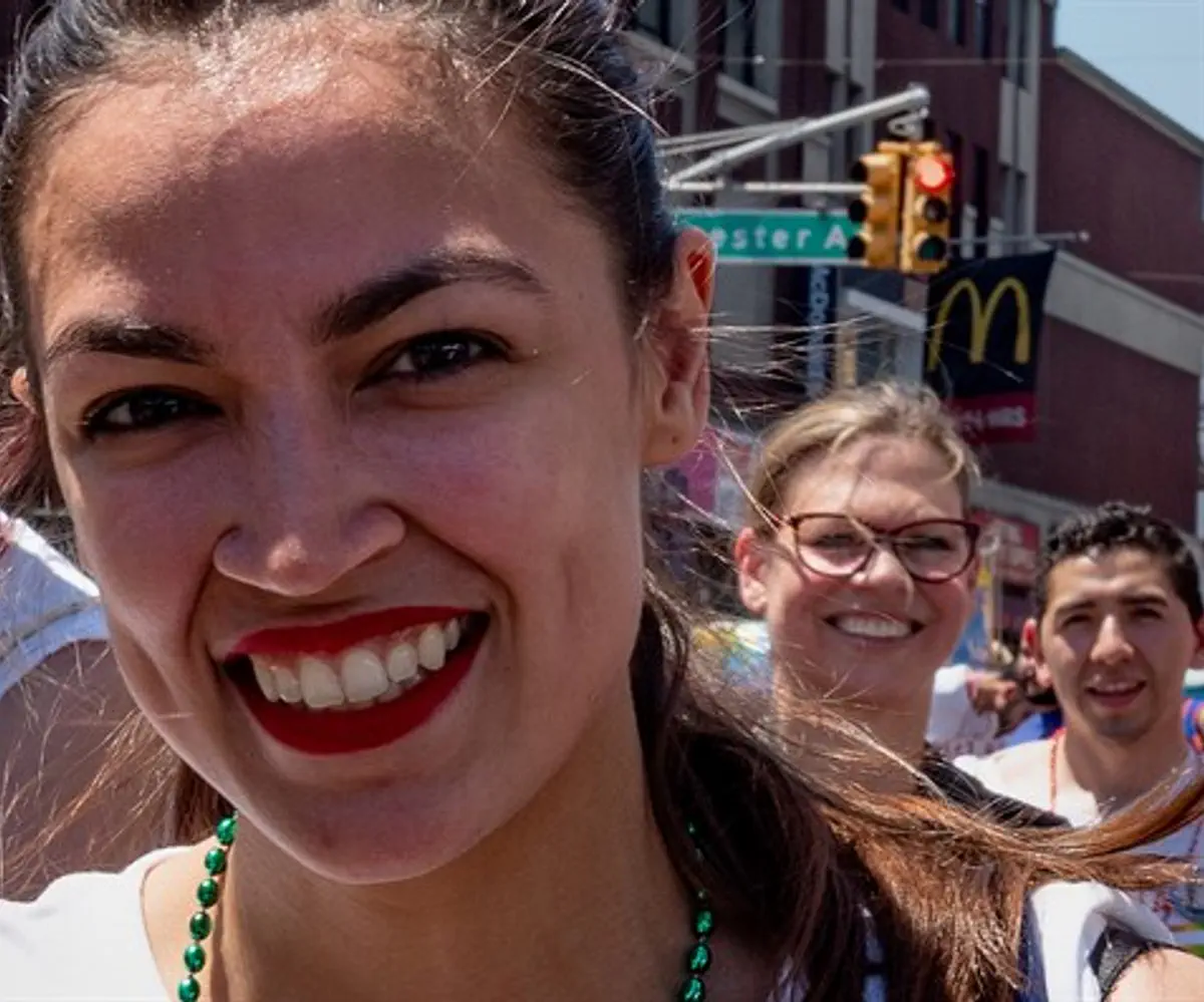Alexandria Ocasio-Cortez marches during the Bronx's 'pride' parade in the Bronx