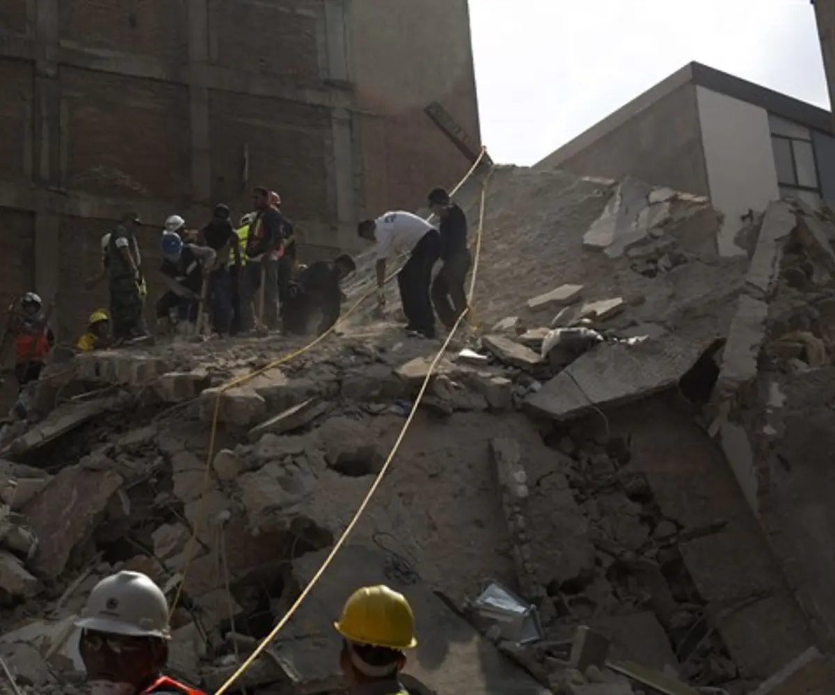 Rescuers work in the rubble after a magnitude 7.1 earthquake struck Mexico City.