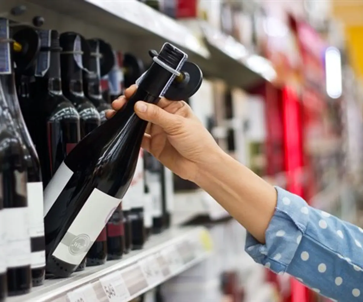 Buying wine at a supermarket (illustrative)