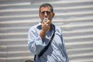 Officer violently pushes Meretz MK