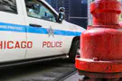 Chicago cop fired, charged after pinning down teen