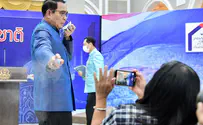 Watch: Thai PM sprays journalists with hand sanitizer