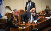 MK removed from Knesset podium while holding burned Bible