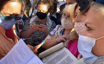 Reform MK Gilad Kariv hands Torah scroll to Women of the Wall