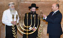 PM Bennett lights Hanukkah candles at Western Wall
