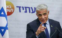 Top ISA official visits Lapid, chiding him for ditching guards