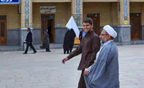 Watch: Iranians knock turbans off clerics' heads 