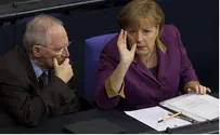 Merkel Got Her Second Bailout But Faces Increasing Opposition