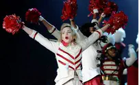 French Rightist Le Pen May Sue Madonna for Use of Swastika