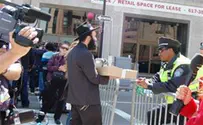 Boston: Donning Tefilin at Moment of Explosion