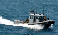 Capsized Navy Boat is Righted