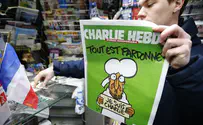 Russia angered by Charlie Hebdo cartoons on plane crash
