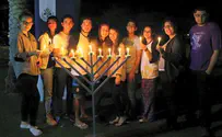 Watch: Emotional Hanukkah candlelighting in 3 continents