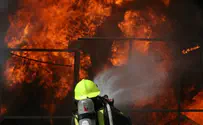 Mob cheers as fire engulfs refugee center in Germany