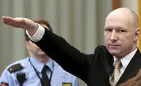 Anders Breivik gives Nazi salute to court