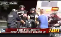 לפחות 12 שוטרים נפצעו במהומות בארה"ב
