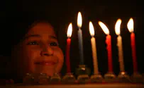 Jewish children raised as Muslims light first Hanukkah candles