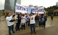 Protesters demonstrate outside of military court