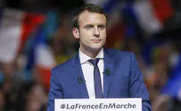 Macron projected to achieve overwhelming majority