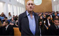 Police raid publishing house over suspected material from Olmert