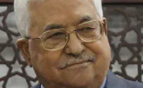 Abbas shows recovery, reading paper with anti-Semitic cartoon