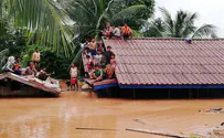 Hundreds missing and several dead after dam collapses in Laos
