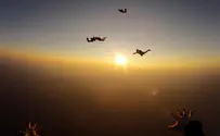 Hundreds of paratroopers jump into 'enemy territory'