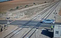 Watch: Train almost smashes car in central Israel