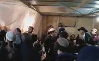 Police raid yeshiva established at scene of attack