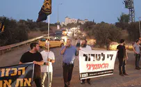 Activists demonstrate at entrance to Deir Qaddis