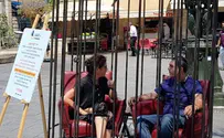 Why did women's aid group set up a giant cage in Haifa?