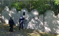 Swastika painted on wall of former Krakow Ghetto