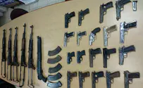 Nineteen pistols, five Kalashnikov rifles - and more