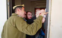 IDF installs mezuzahs on bunk doorposts