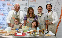 Ambassador Friedman helps make cheesecake for the elderly